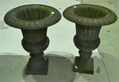 Lot 1347 - Pair of Victorian cast iron campana shaped garden urns, 54cm diameter