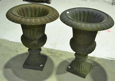 Lot 1348 - Pair of Victorian cast iron campana shaped garden urns, 54cm diameter