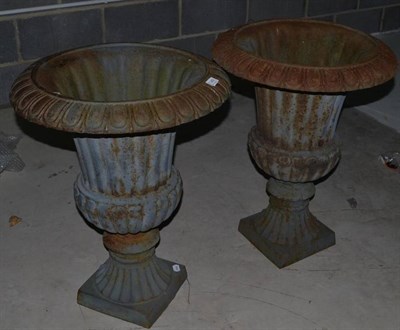 Lot 1349 - Pair of Victorian cast iron campana shaped garden urns, 54cm diameter