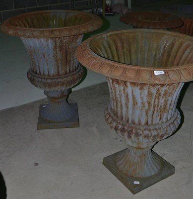 Lot 1350 - Pair of Victorian cast iron campana shaped garden urns, 72cm diameter