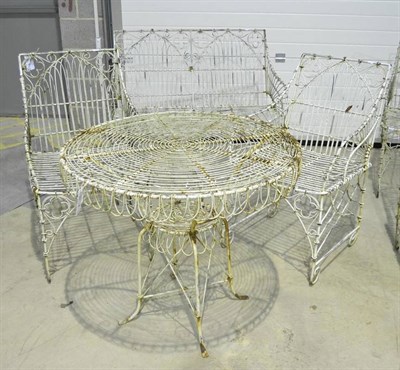 Lot 1351 - A four piece suite of garden wirework seat furniture comprising; two seater settee, pair of...