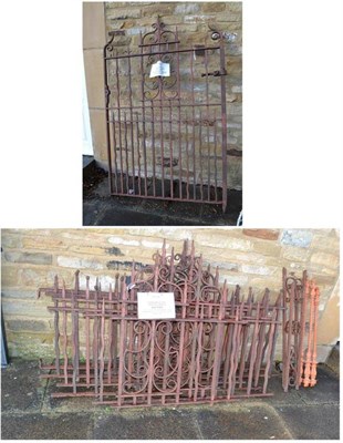 Lot 1353 - A 19th century metal garden gate, 120cm wide, seven assorted fence sections to match (assorted...