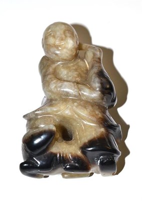 Lot 5 - A Chinese jade type figure of a boy holding a bottle vase, 8.5cm high
