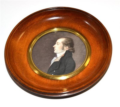 Lot 38 - A 19th century Continental school miniature bust portrait of a gentleman, wearing a white stock and
