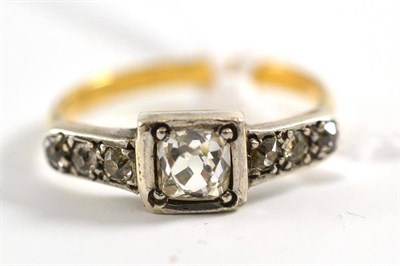 Lot 40 - An early 20th century diamond ring, an old cut diamond in a squared setting, with three old cut...