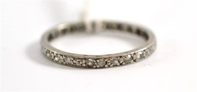 Lot 41 - A diamond set full eternity ring, eight-cut diamonds in white claw settings, to a (worn) flat sided