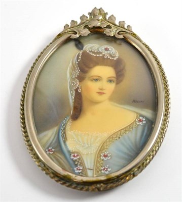 Lot 50 - A miniature portrait of a lady with jewellery headdress and dress, indistinctly signed, oval,...