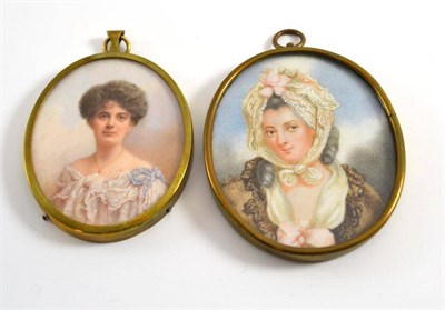 Lot 52 - A 19th century Continental school miniature portrait of a lady in lace head scarf, oval, 7cm by...
