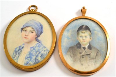 Lot 53 - A portrait miniature a girl wearing a blue head scarf, oval, 7.3cm by 5.8cm; and a similar...