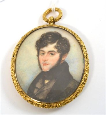 Lot 55 - A 19th century Continental school miniature portrait of a gentleman wearing a black coat, 5.2cm...