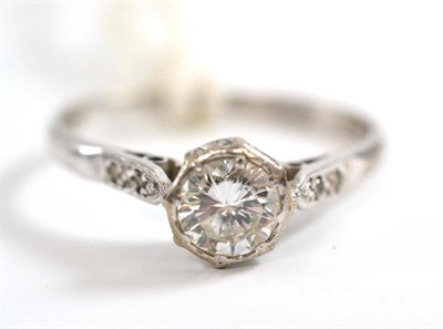 Lot 57 - A diamond solitaire ring, the round brilliant cut diamond in a white rubbed over setting, to...