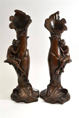 Lot 88 - A pair of bronzed copper vases in Art Nouveau style, applied with nymphs, signed Angles, 45cm high
