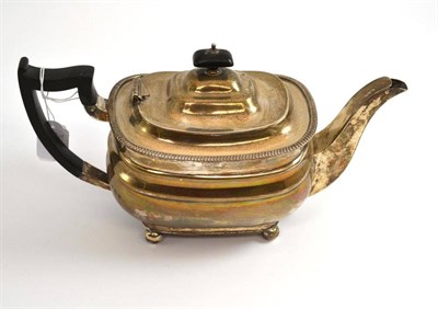Lot 89 - # A George IV silver teapot by James Dixon & Sons, Sheffield 1932, of moulded oval form, cast...