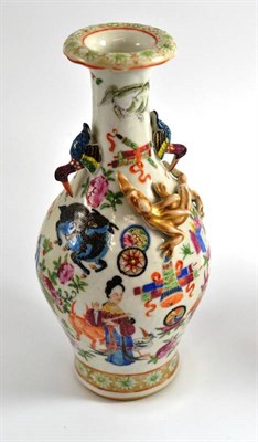 Lot 100 - A Cantonese porcelain baluster vase, printed with figures, beasts and objects, 25cm high