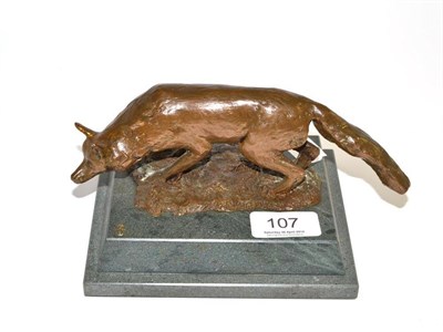 Lot 107 - A modern bronze figure of a fox on a slate base, 18.5cm wide