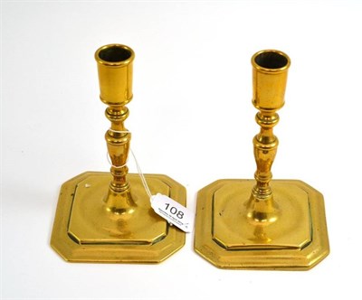 Lot 108 - # A brass dwarf candlestick in 18th century style with baluster stem, 14.5cm high; and a...