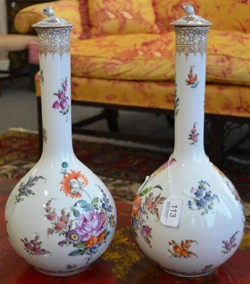 Lot 113 - Pair of Dresden porcelain bottle vases and covers, flower sprays and painted marks, 37cm high
