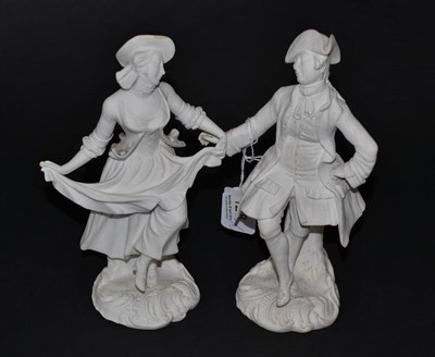 Lot 128 - A pair of Minton bisque porcelain figures of an 18th century gallant and his lady each dancing...