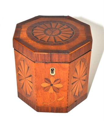 Lot 140 - A George III cross banded satinwood and marquetry octagonal tea caddy with foliate decoration,...