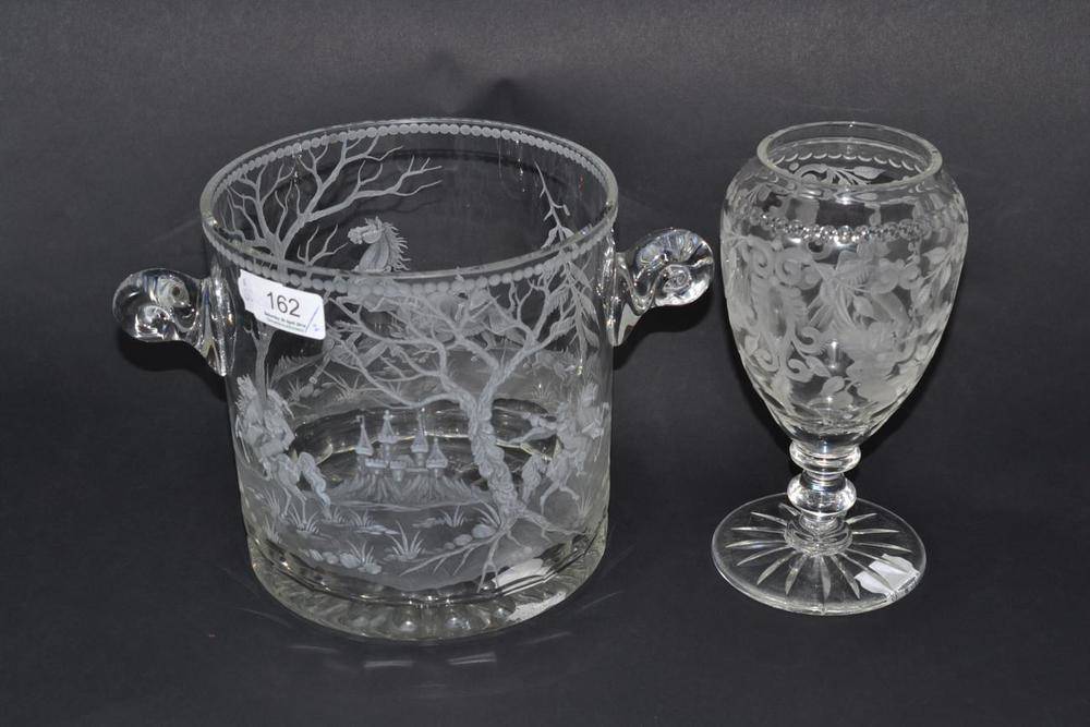 Lot 162 - An engraved glass wine cooler, decorated with figures on horseback and a castle in the...