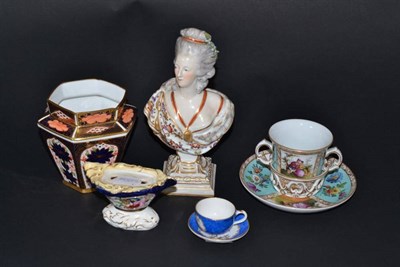 Lot 168 - A Volkstedt porcelain bust of a lady, 20cm high, a Wolfsohn trembleuse chocolate cup and...