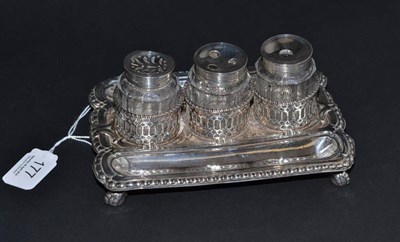 Lot 177 - A George III silver inkstand, London 1772; with three cut glass bottles, mounts unmarked, 18cm wide