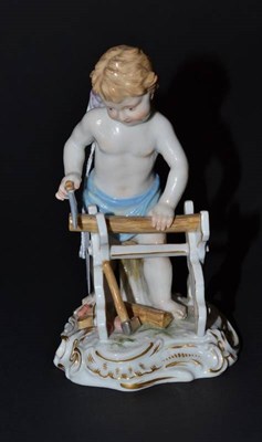 Lot 178 - A Meissen porcelain figure of Cupid as a woodsman, 15cm high