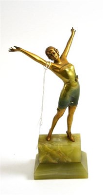 Lot 180 - An Art Deco cold painted spelter figure of a dancer, on an onyx base, 20cm high