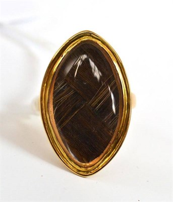 Lot 205 - A mourning ring containing plaited hair, the lozenge frame engraved to the reverse 'WS Ob 19th...