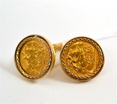 Lot 210 - # A pair of 9ct gold set half sovereign cufflinks, the 1905 and 1909 coins within a diamond cut...