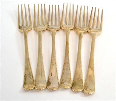 Lot 217 - A set of six George III silver table forks, London 1774