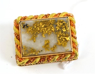 Lot 222 - # An agate pendant/slider, the rectangular agate with pyrite inclusions, in a collet setting,...