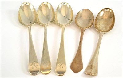 Lot 229 - A set of three George III silver tablespoons, London 1780; a George II tablespoon, London 1734; and