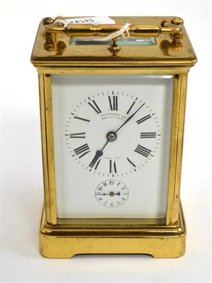 Lot 268 - A gilt brass striking and repeating carriage clock with alarm, retailed by Finnigans Ltd,...