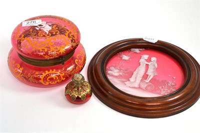 Lot 276 - A 19th century cranberry glass casket; a Mary Gregory type circular plaque; and cranberry glass and