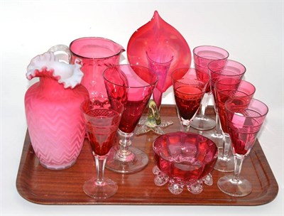 Lot 288 - Tray of assorted cranberry glass including jug, six matching wine glasses