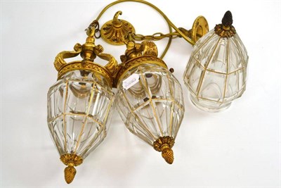 Lot 296 - Pair of Regency style cut glass and gilt metal pendant light fittings and an additional shade