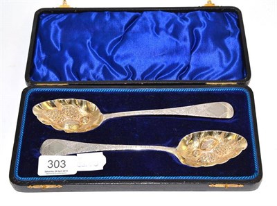 Lot 303 - A pair of George III silver spoons in fitted case