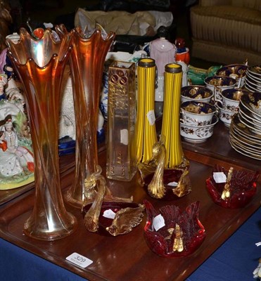 Lot 329 - A pair of yellow glass vases with silver rims, a pair of carnival glass vases, four glass swans and