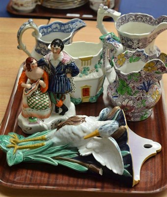 Lot 341 - Four 19th century jugs; majolica wall pocket; and a Staffordshire porcelain figure group