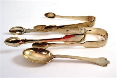 Lot 374 - # A Scottish silver trefid spoon and three pairs of Georgian silver sugar tongs