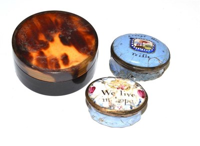 Lot 389 - Tortoiseshell circular box and two Georgian enamel patch boxes 'We Live In Hope' and 'Accept...