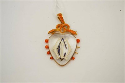 Lot 398 - A rock crystal and coral heart shaped pendant with bow motif surmount, and enamelled initials CM in