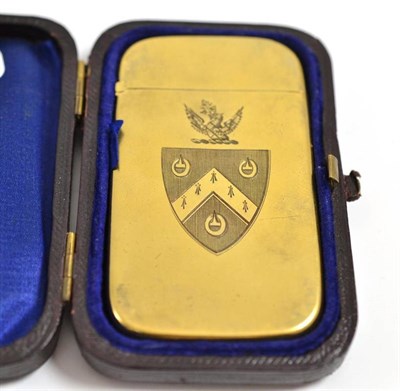 Lot 400 - Victorian silver gilt card case engraved with a family crest, Birmingham assay 1886, in fitted case