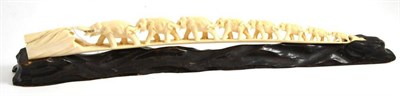 Lot 424 - Early 20th century ivory carving comprising eight graduated elephants