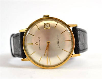 Lot 445 - # A 9ct gold automatic calendar wristwatch, signed EternaMatic, Centenaise, 1965, 34mm wide