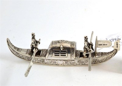 Lot 454 - A Continental silver model of a gondola with two gondoliers, import marks for Chester 1907,...