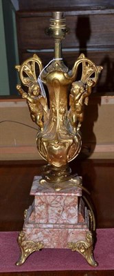 Lot 477 - A gilt metal and marble lamp base, 52cm high