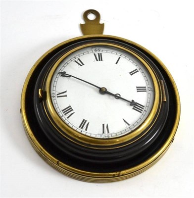 Lot 499 - A small Sedan timepiece, ebonised and brass bounded case, enamel dial, later mechanical...