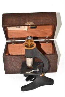 Lot 511 - A compound microscope in fitted case bearing label A.R Baines, Harrogate